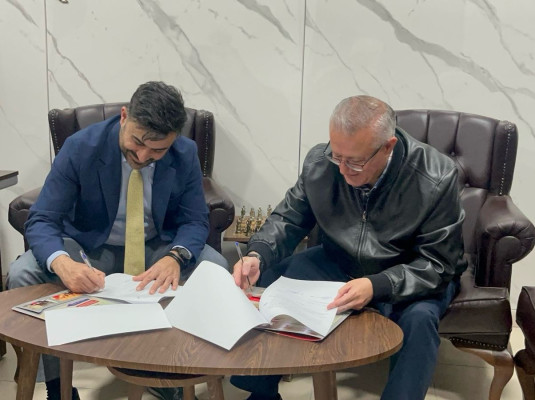 Signing a Strategic Partnership Agreement with Al-Madar Schools